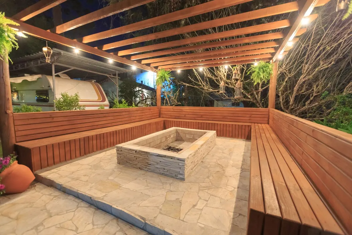 Built-in fire pit within a deck surround
